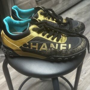 CHANEL Black and Gold Athletic Shoes